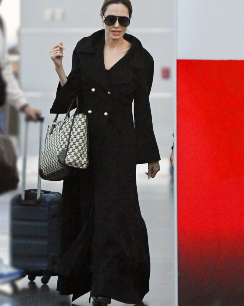 Iconic Double-Breasted Black Trench Coat – Channel Angelina Jolie’s Style
